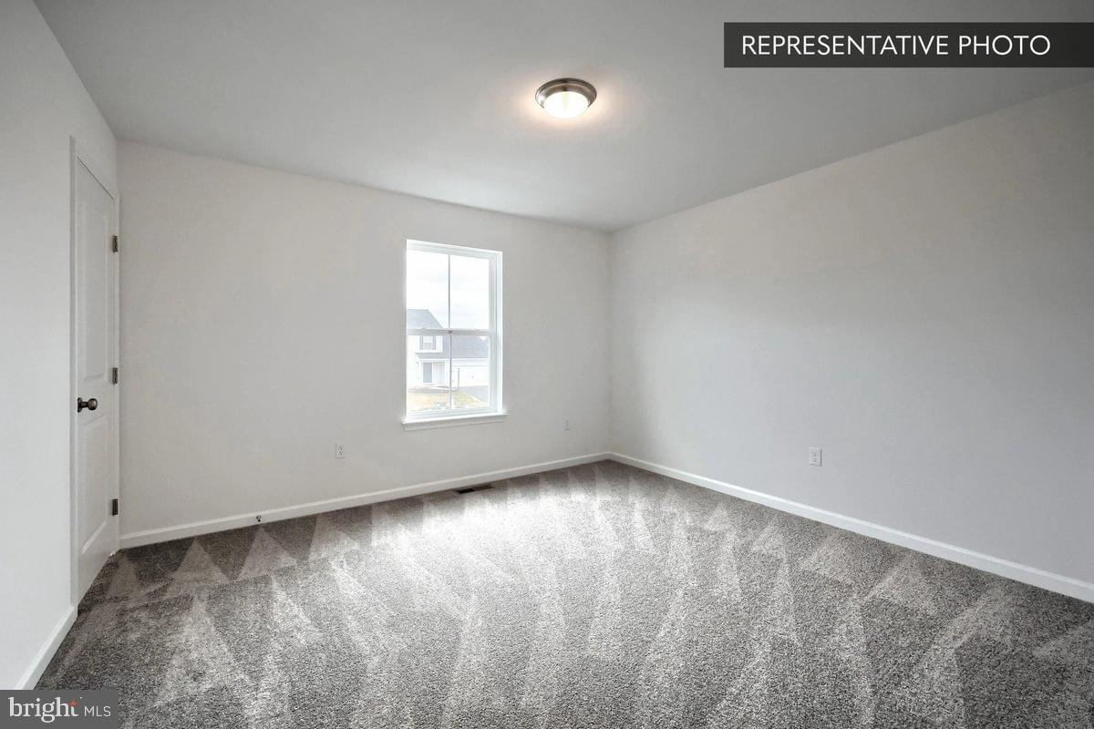 Pin Oak Plan At Hills Spring Grove, PA 17362 - Photo 37 of 38 a view of a room with window