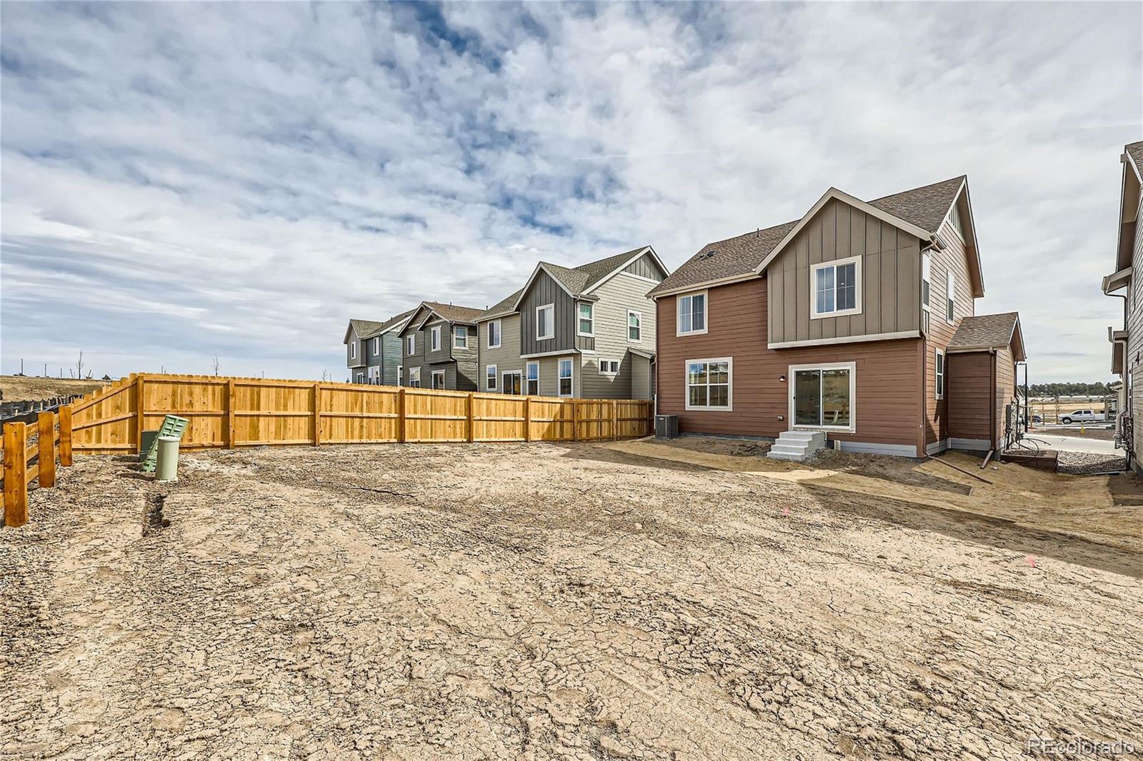 864 Yankee Boy Loop Elizabeth, CO 80107 - Photo 27 of 36 a view of a yard in front of a house