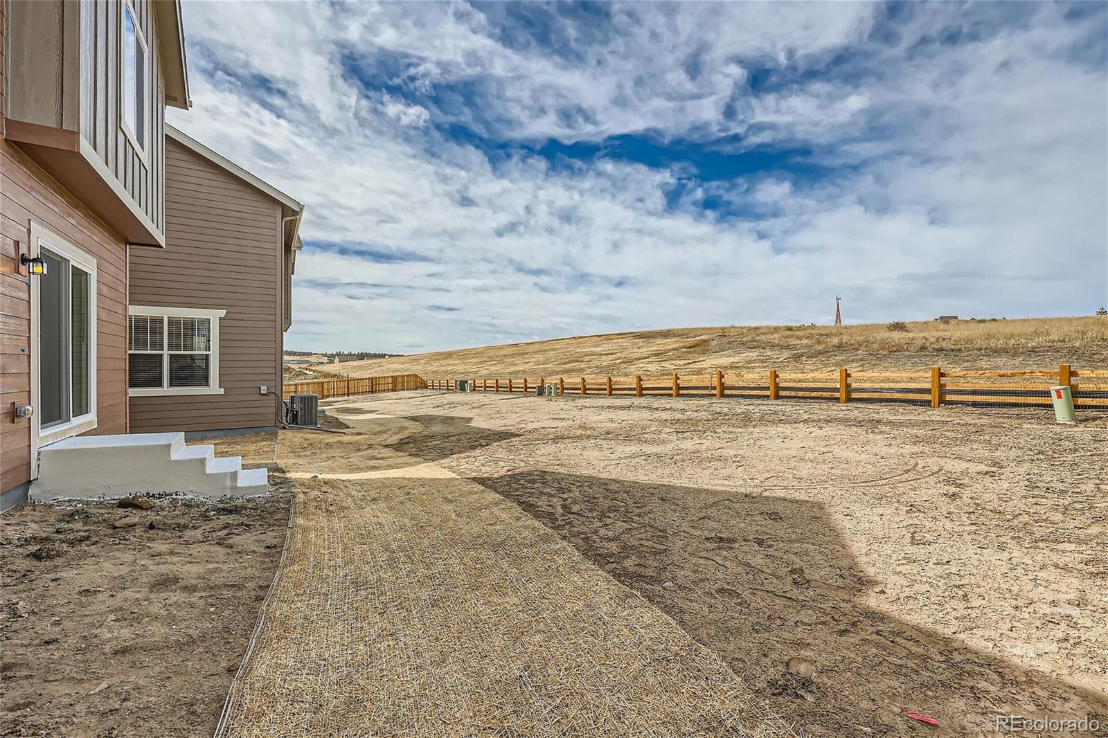 864 Yankee Boy Loop Elizabeth, CO 80107 - Photo 28 of 36 a view of an ocean beach