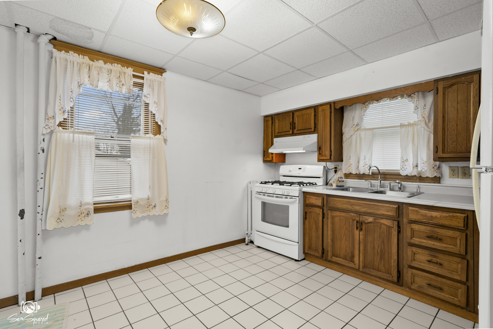 276 West 2nd Street Manteno, IL 60950 - Photo 11 of 20 a bathroom with a sink double vanity and a mirror