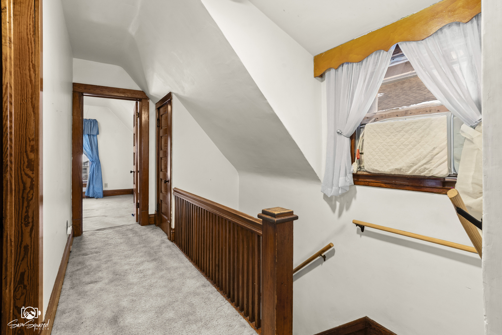 276 West 2nd Street Manteno, IL 60950 - Photo 13 of 20 a view of a hallway with wooden floors and stairs