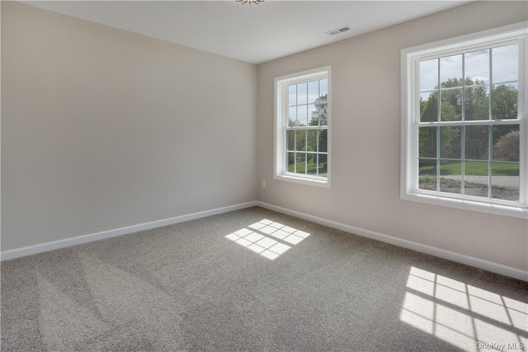 991 Freedom Road Pleasant Valley, NY 12569 - Photo 15 of 23 an empty room with a window