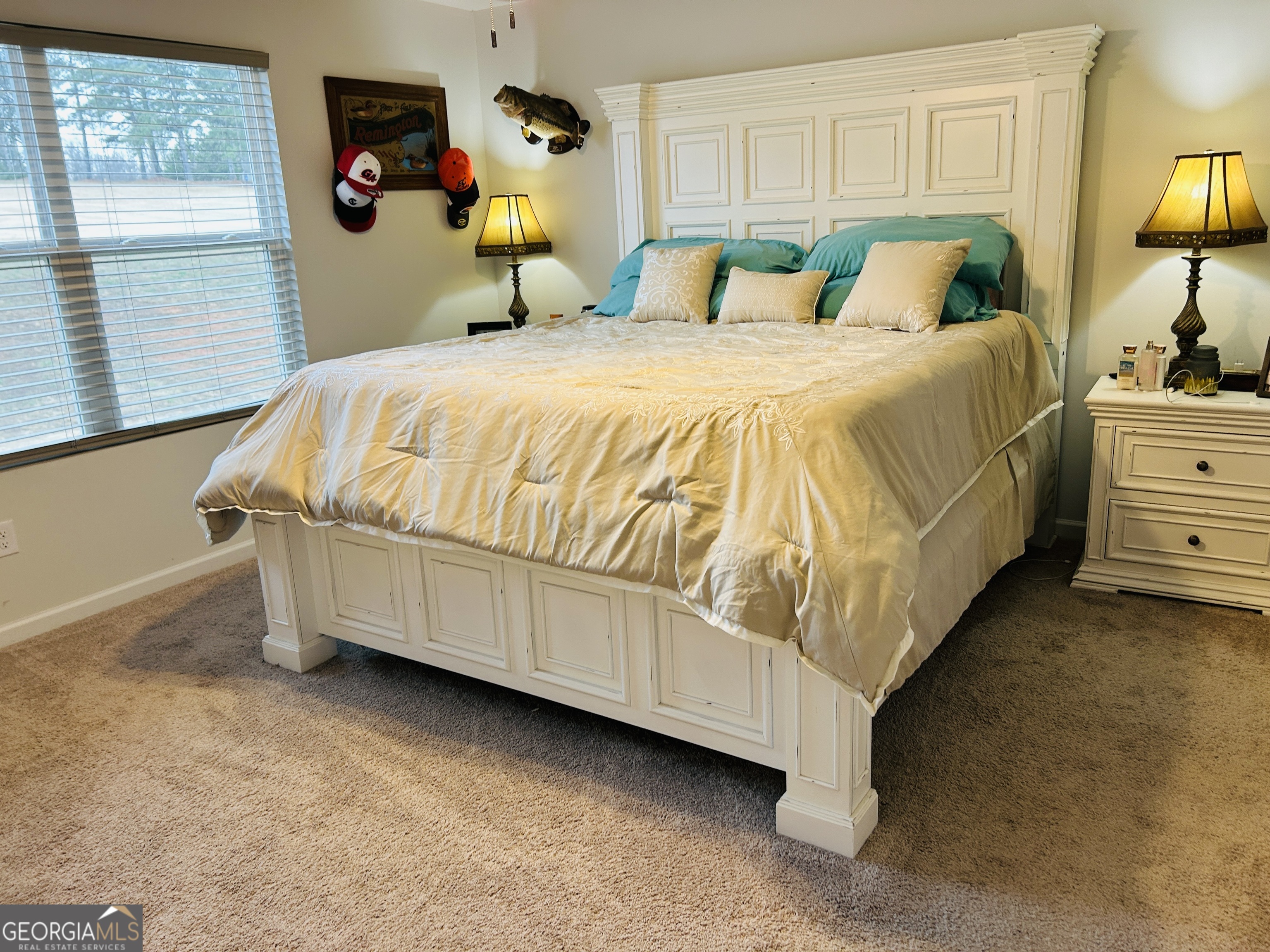 151 Sweet Briar Way Homer, GA 30547 - Photo 13 of 32 a bedroom with a bed and dresser with mirror