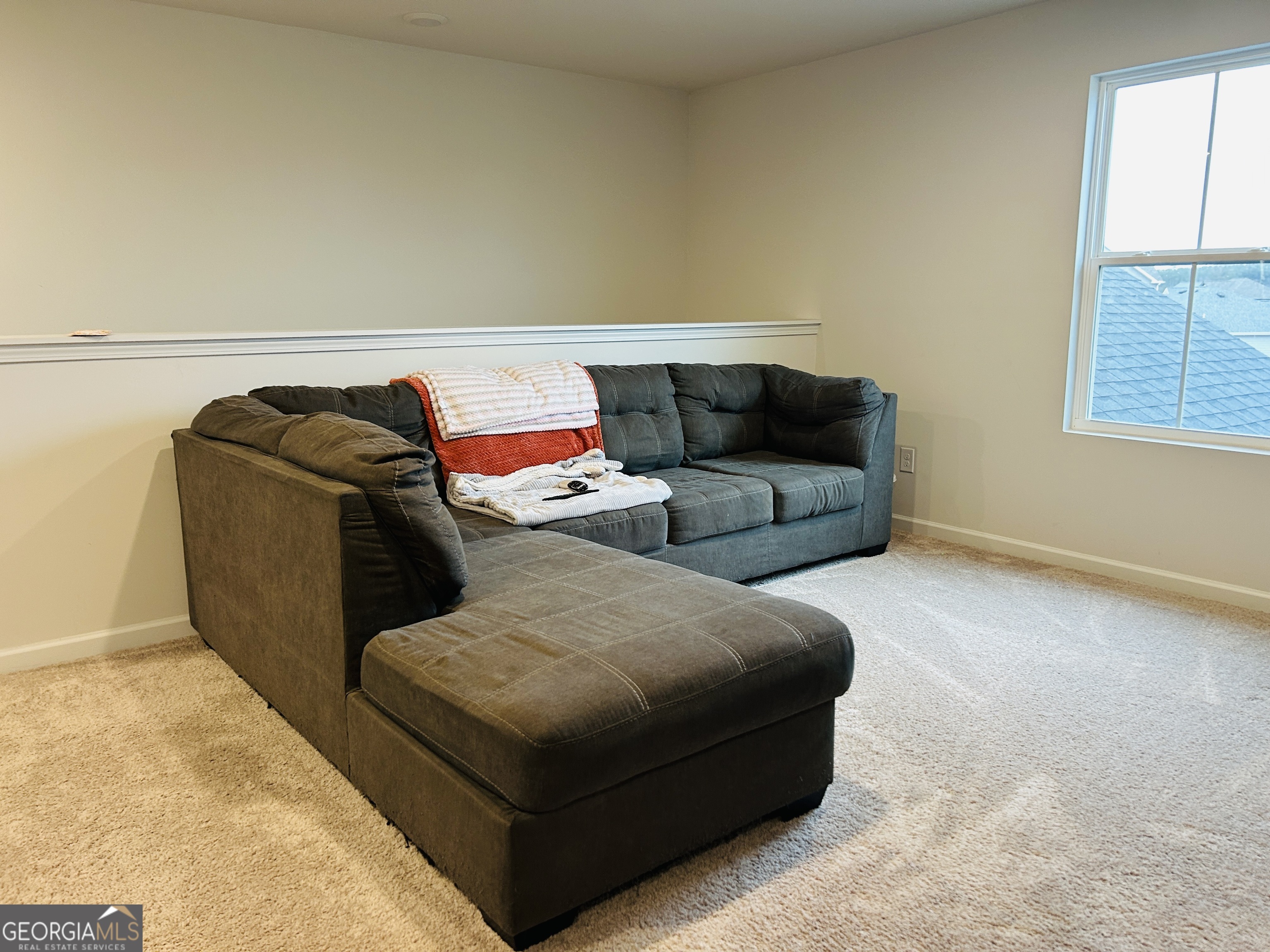 151 Sweet Briar Way Homer, GA 30547 - Photo 16 of 32 a living room with furniture and window