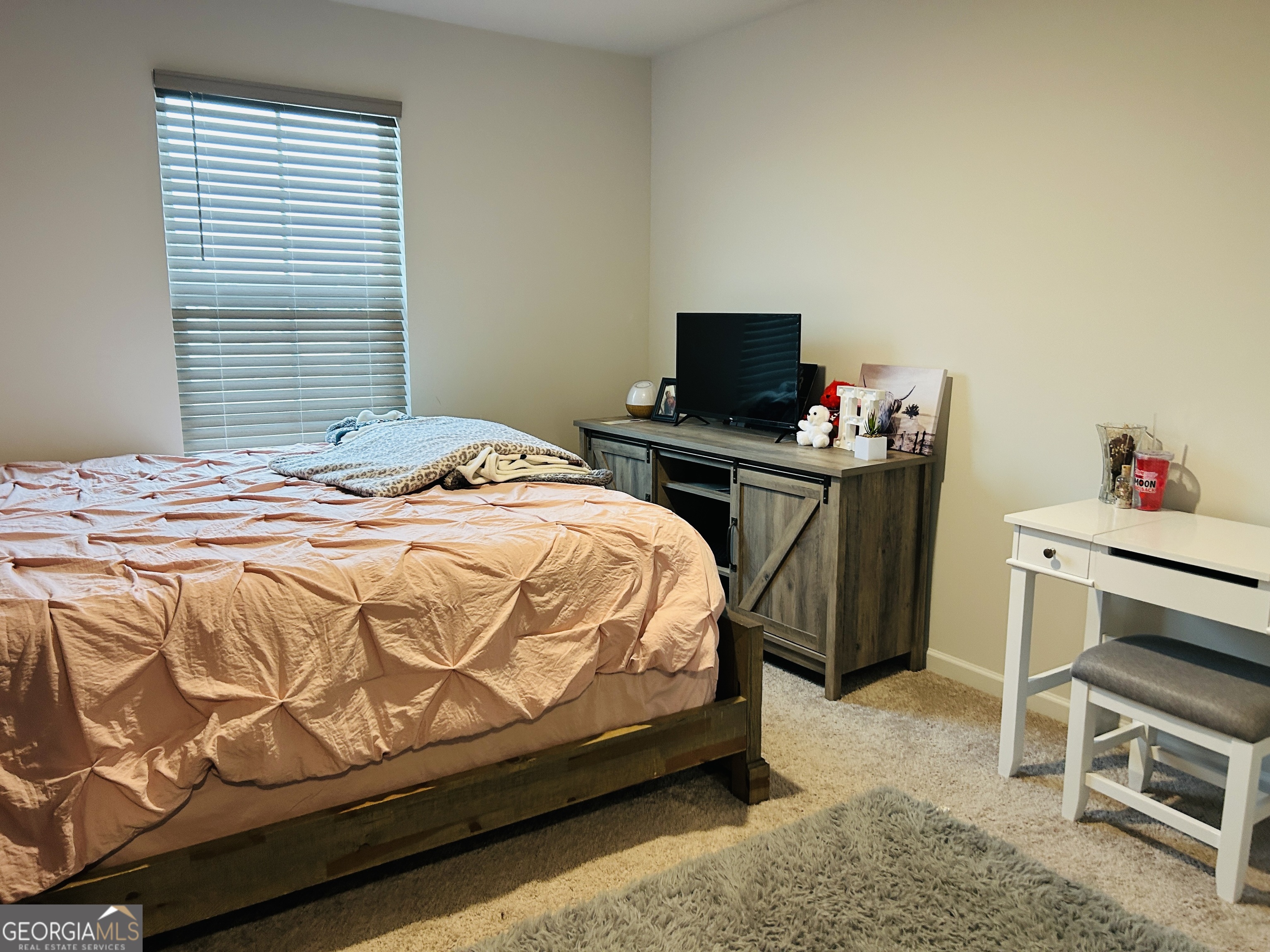 151 Sweet Briar Way Homer, GA 30547 - Photo 20 of 32 a bedroom with a bed and a television