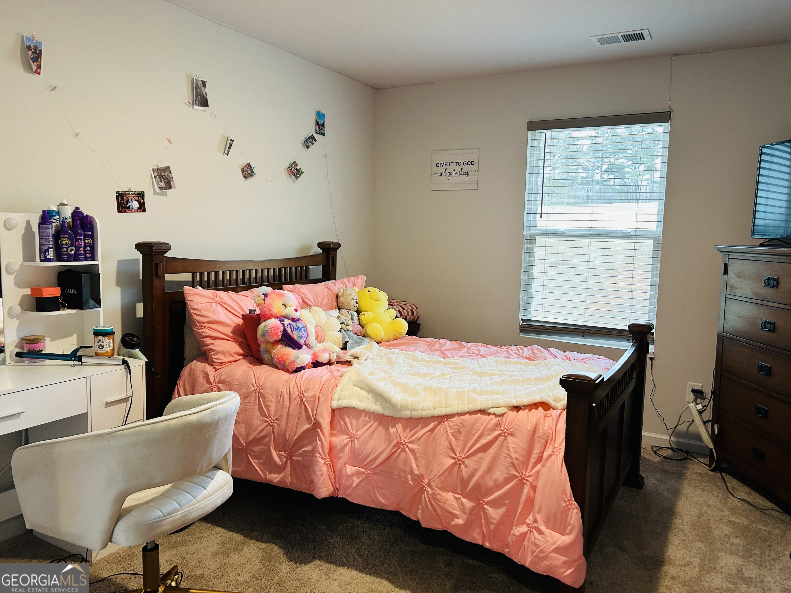 151 Sweet Briar Way Homer, GA 30547 - Photo 21 of 32 a bedroom with a bed and a window