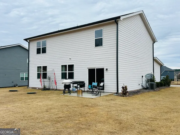 a view of a house with a patio