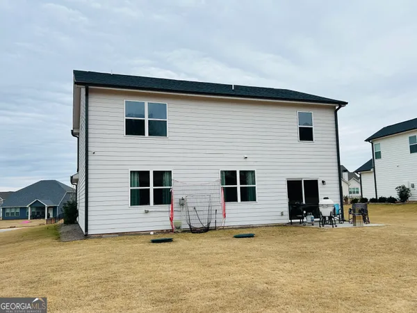 a house that has a window in front of it