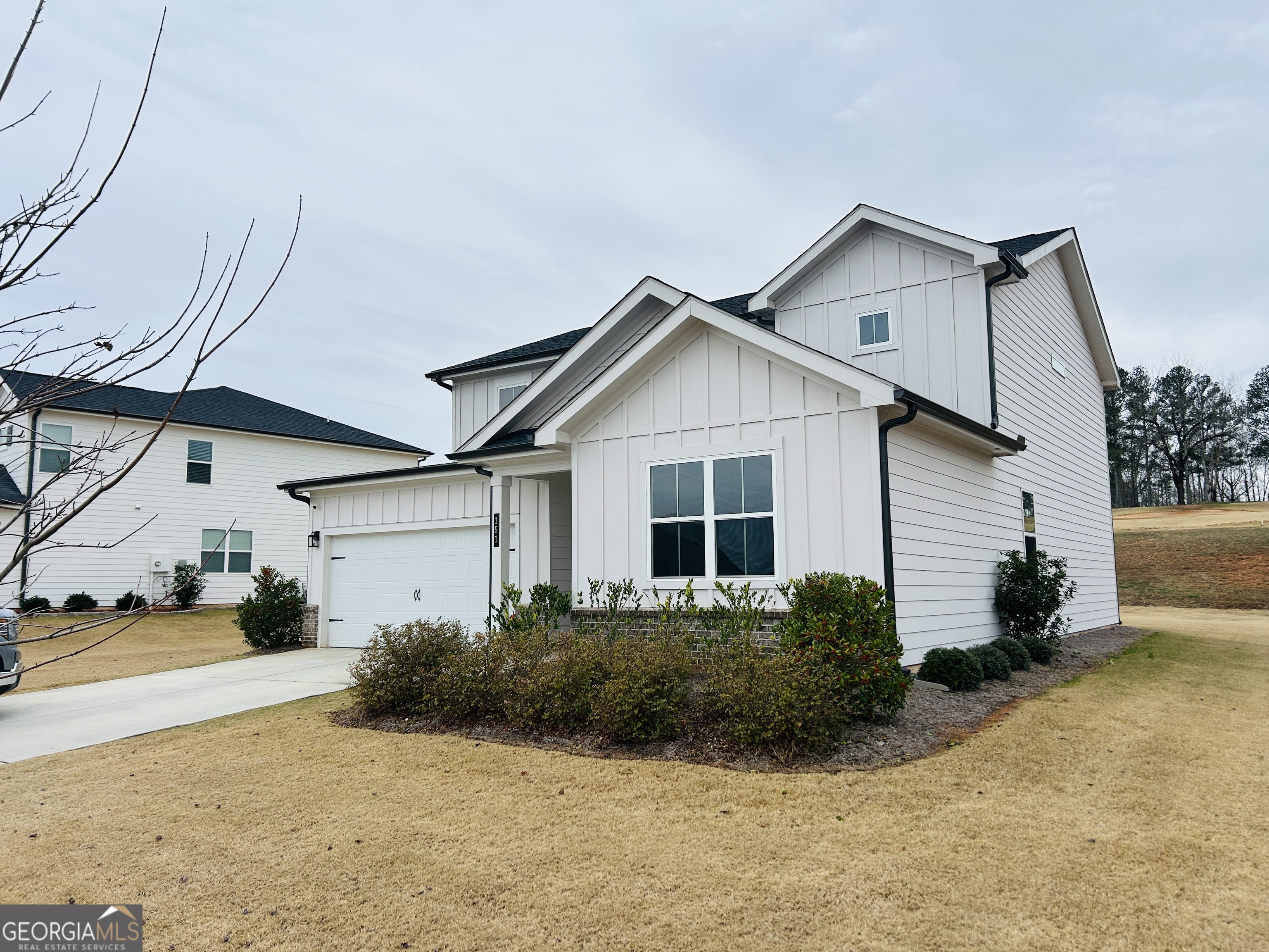 151 Sweet Briar Way Homer, GA 30547 - Photo 32 of 32 a view of a house with backyard and garden