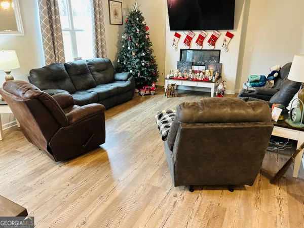 a living room with furniture and a couch