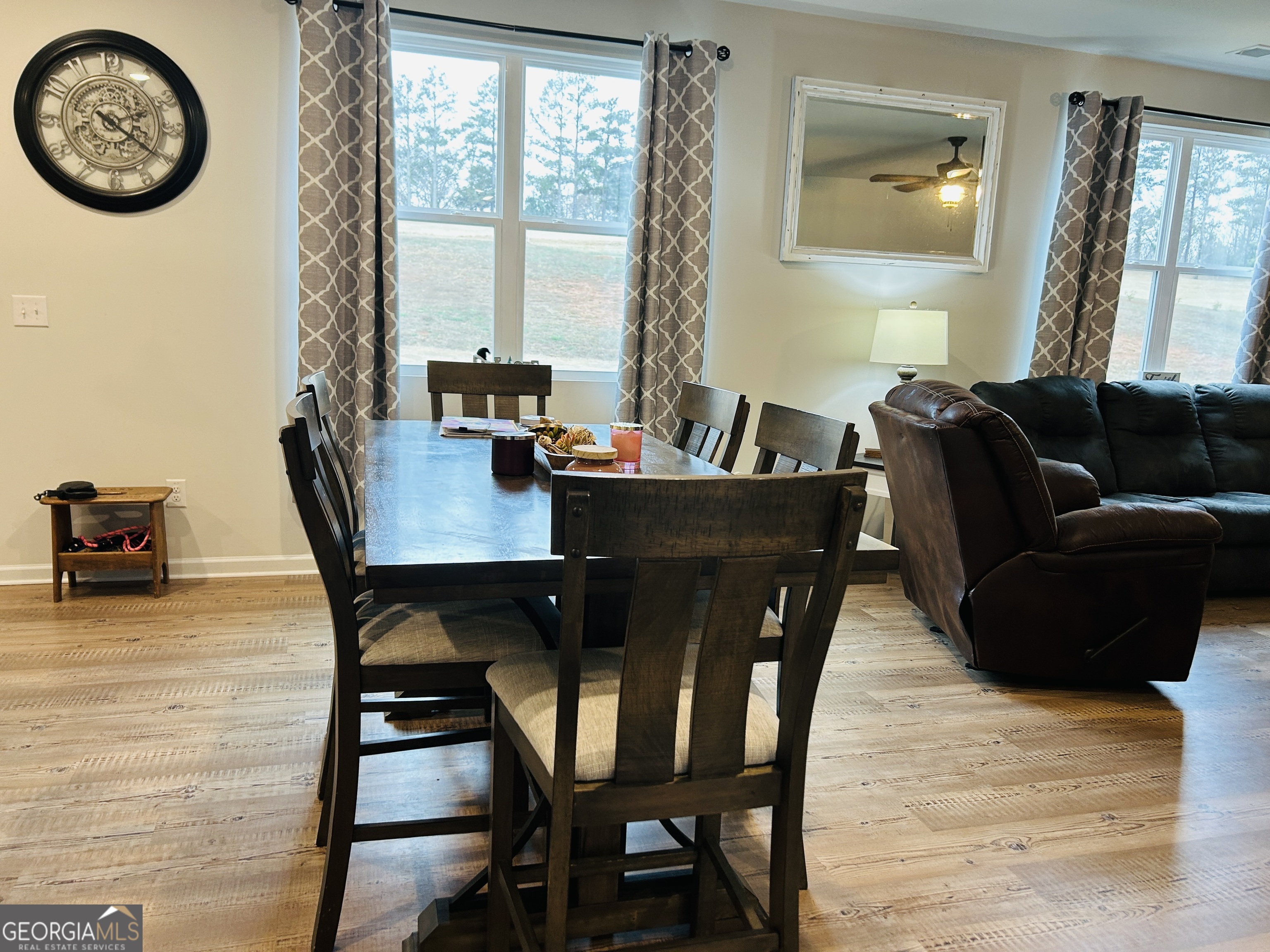 151 Sweet Briar Way Homer, GA 30547 - Photo 9 of 32 a view of a dining room with furniture and a large window