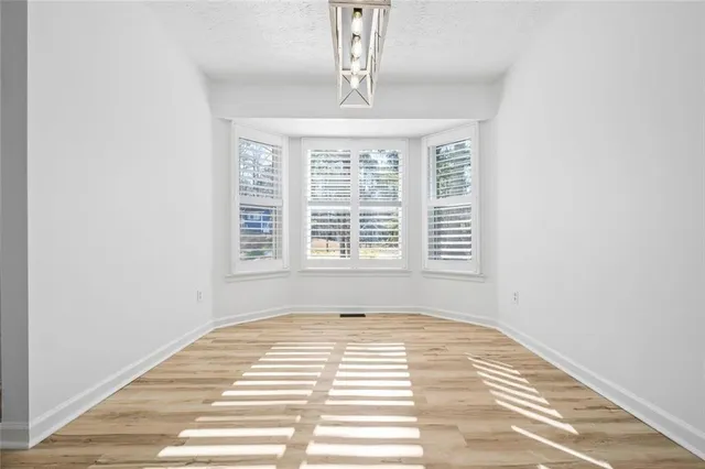 a view of a room with windows