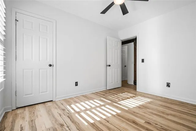 a view of a livingroom with wooden floor