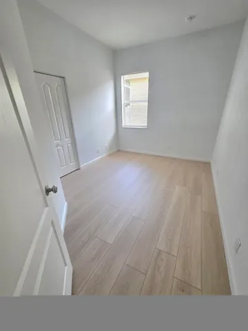 a bathroom with a sink a shower and a mirror