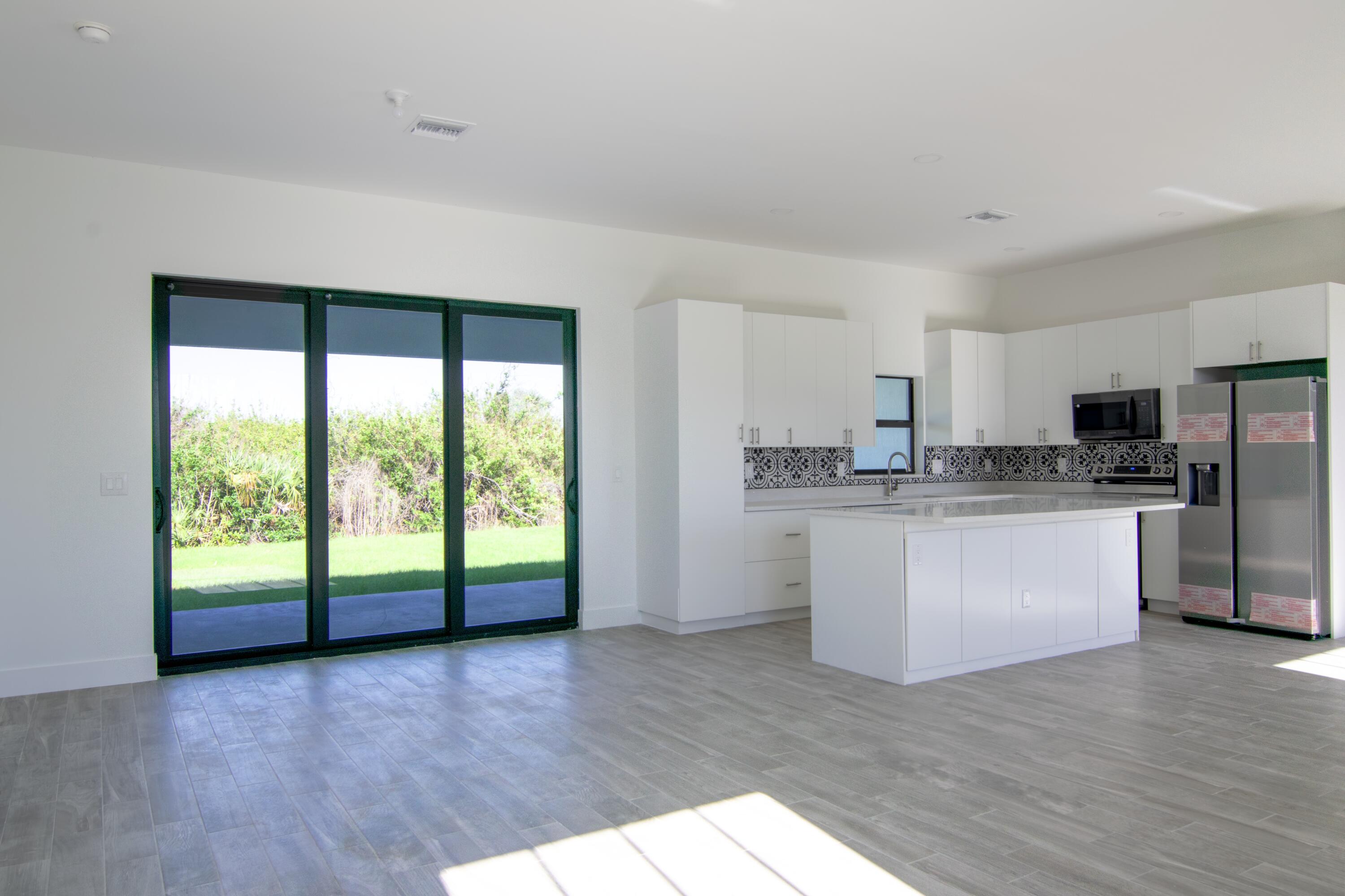 8126 Thruso Road Port Charlotte, FL 33981 - Photo 14 of 32 dinning/living room