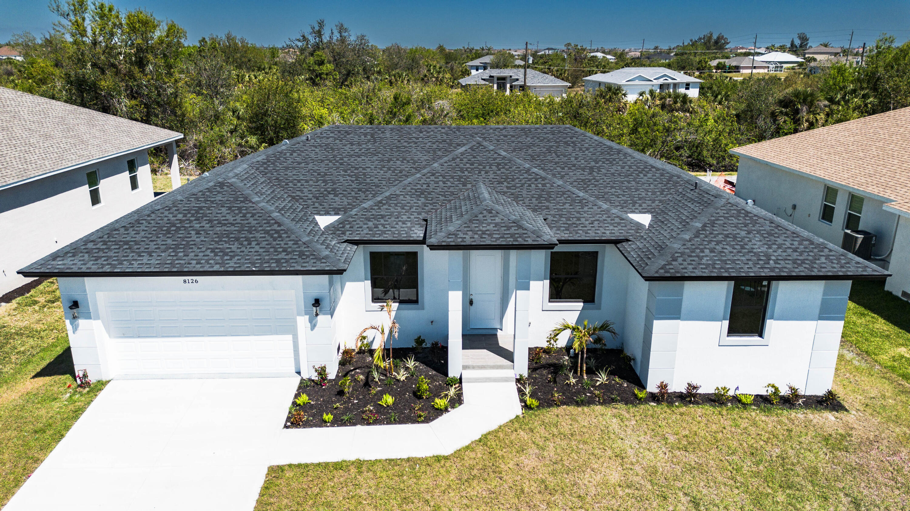 8126 Thruso Road Port Charlotte, FL 33981 - Photo 3 of 32 Front view 8126 Thruso