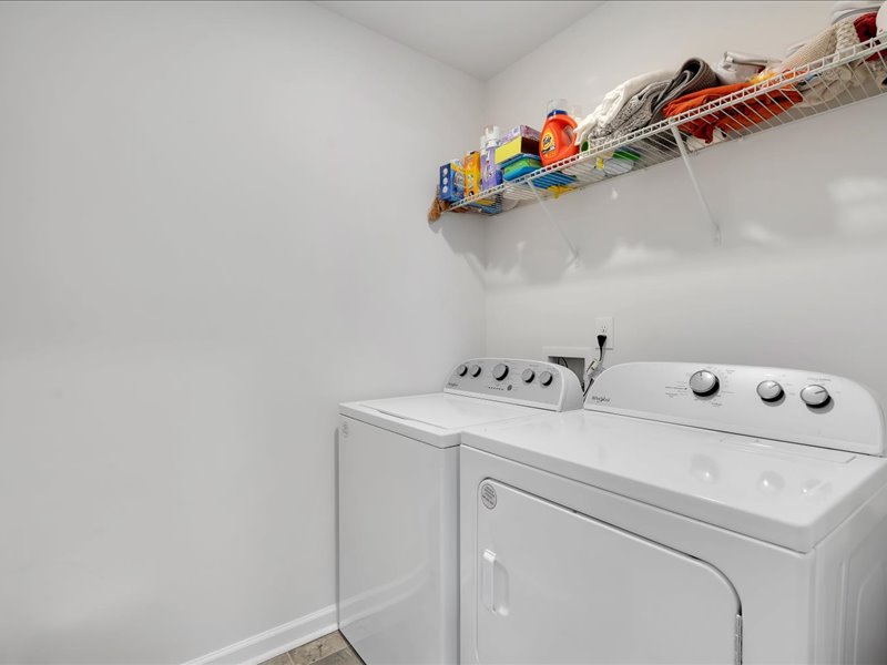 525 Ashwood Way Easley, SC 29640 - Photo 23 of 36 This dedicated laundry space offers convenience and functional design.