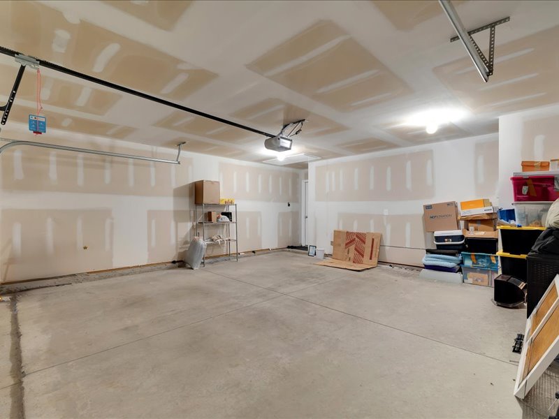 525 Ashwood Way Easley, SC 29640 - Photo 24 of 36 This spacious garage offers ample room and convenience for your vehicles and storage needs.