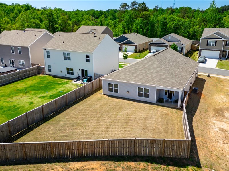 525 Ashwood Way Easley, SC 29640 - Photo 29 of 36 This aerial view showcases a residential property with a spacious backyard, offering privacy and outdoor potential.