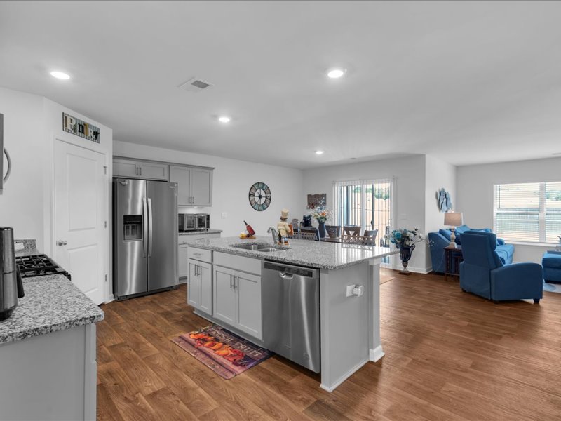 525 Ashwood Way Easley, SC 29640 - Photo 5 of 36 This open concept kitchen and living space provides seamless flow for daily living.