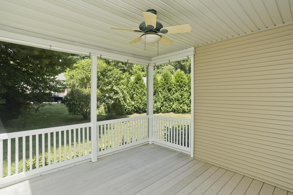 28 High Pine Circle, Unit 28 Wilbraham, MA 01095 - Photo 32 of 38 a view of a porch with wooden floor