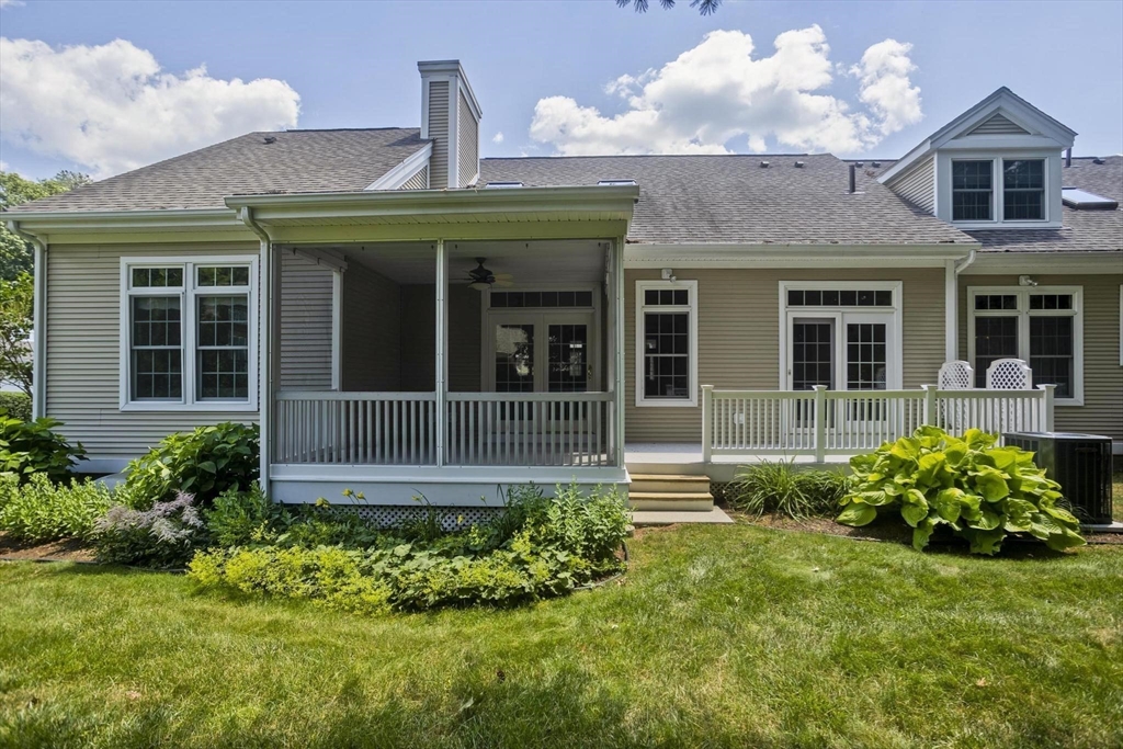 28 High Pine Circle, Unit 28 Wilbraham, MA 01095 - Photo 35 of 38 front view of a house with a yard