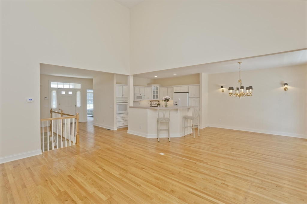 28 High Pine Circle, Unit 28 Wilbraham, MA 01095 - Photo 5 of 38 a view of a kitchen with wooden floor