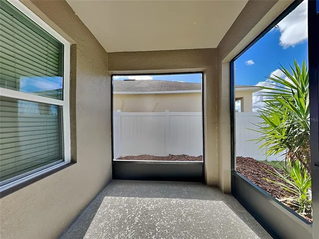 a view of a couches in the balcony