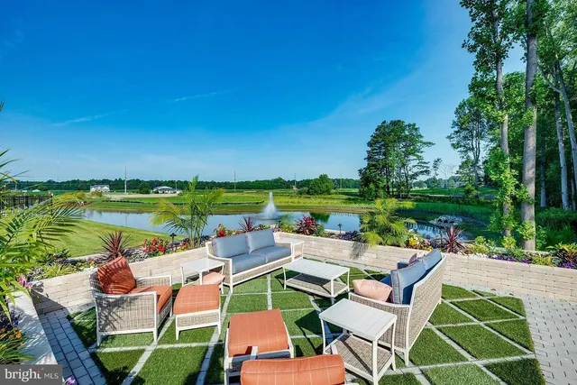 a view of a chairs and table in the patio