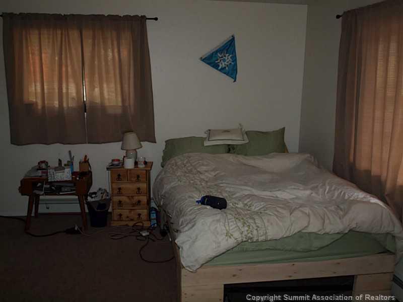 17 West Hansen Road Keystone, CO 80435 - Photo 7 of 25 a bedroom with a bed and a window