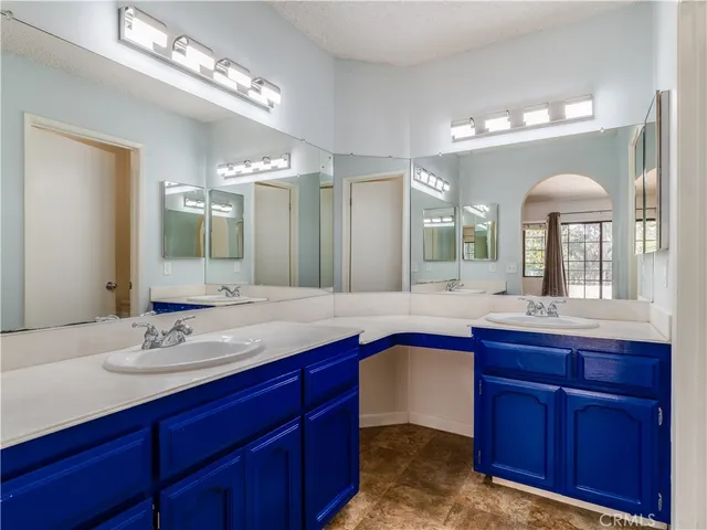 a view of a hallway with windows