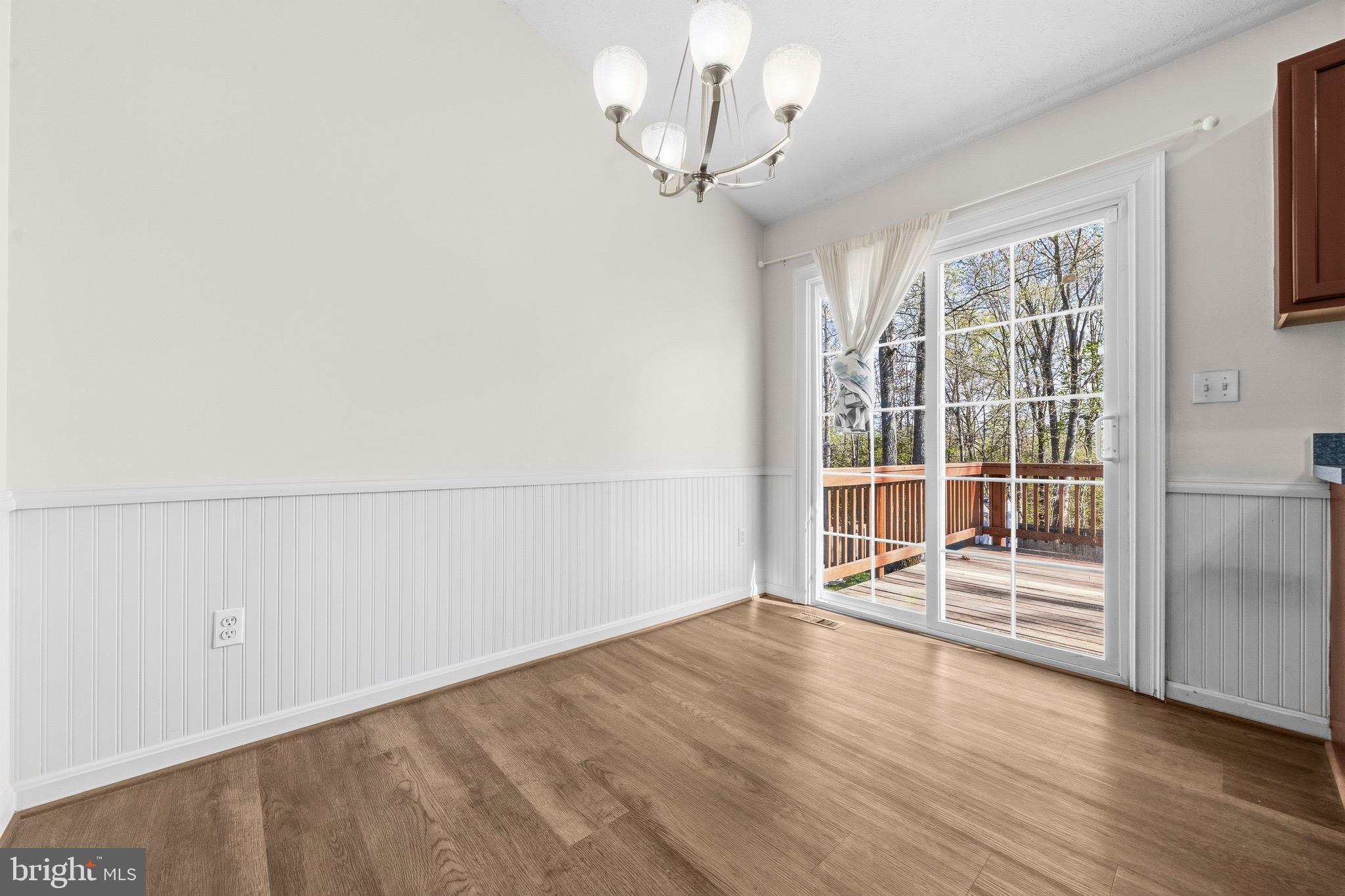 2616 Ruffin Drive Fredericksburg, VA 22408 - Photo 12 of 36 wooden floor in an empty room with a window