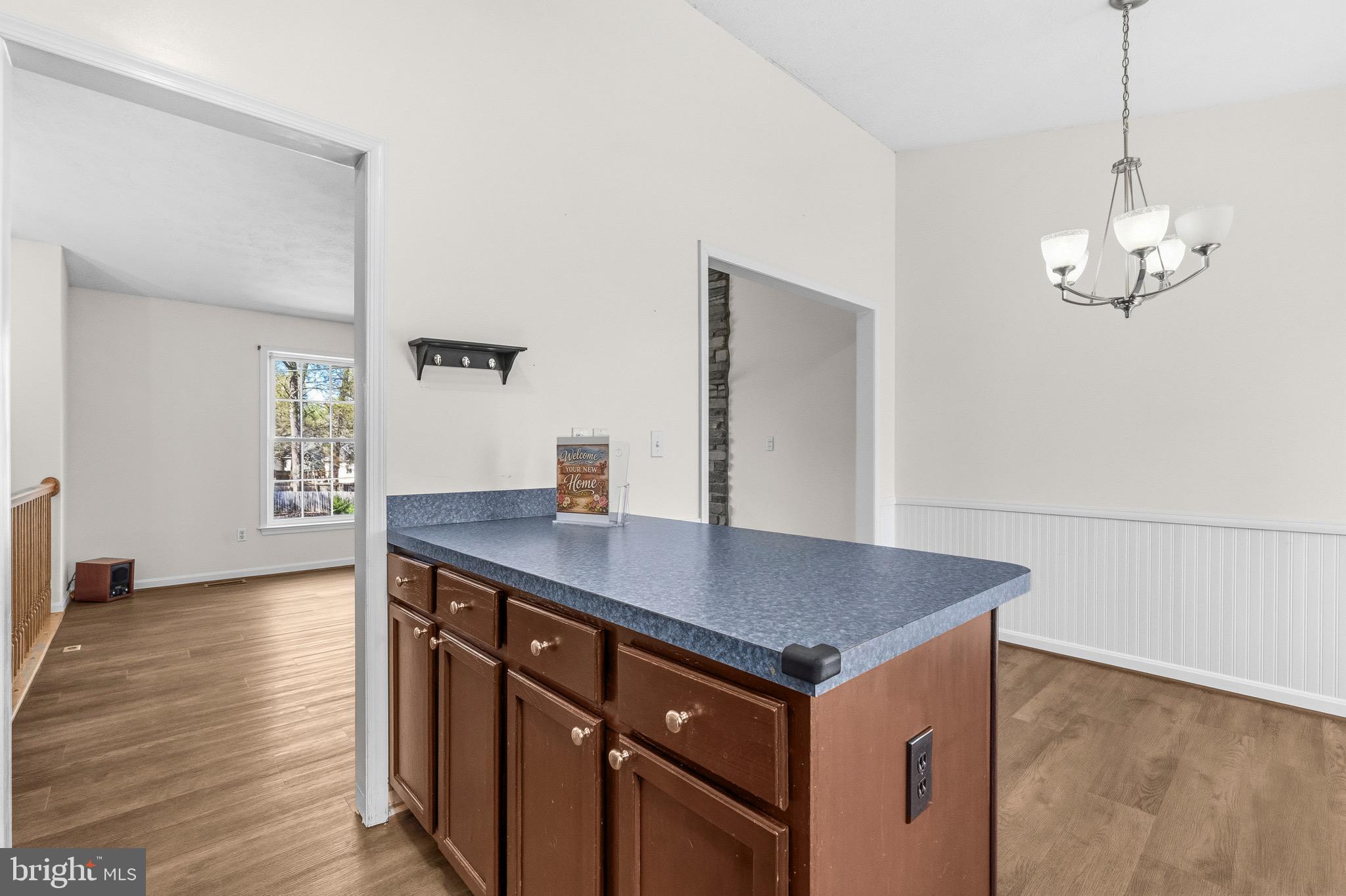 2616 Ruffin Drive Fredericksburg, VA 22408 - Photo 16 of 36 a view of kitchen island and wooden floor