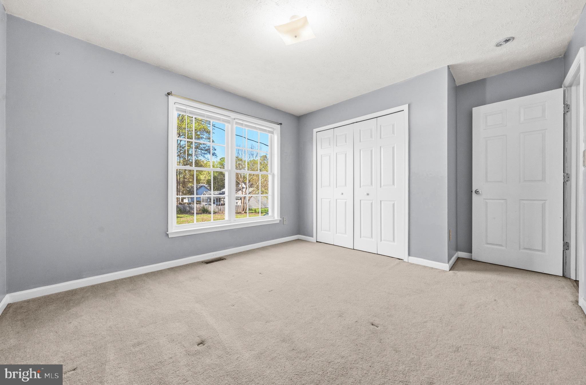 2616 Ruffin Drive Fredericksburg, VA 22408 - Photo 21 of 36 a view of an empty room with a window