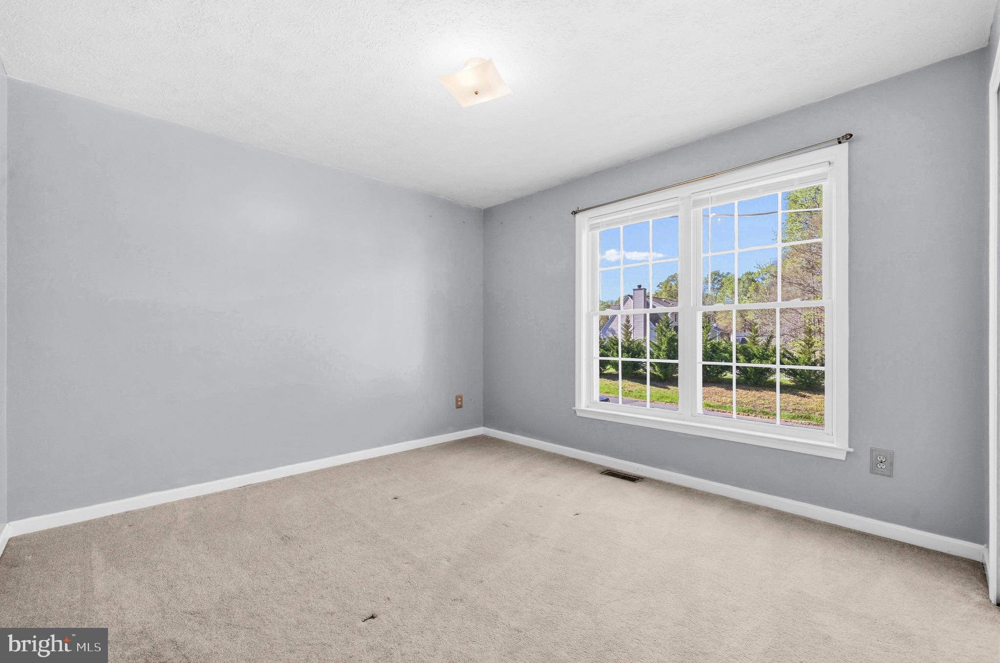 2616 Ruffin Drive Fredericksburg, VA 22408 - Photo 22 of 36 an empty room with a window