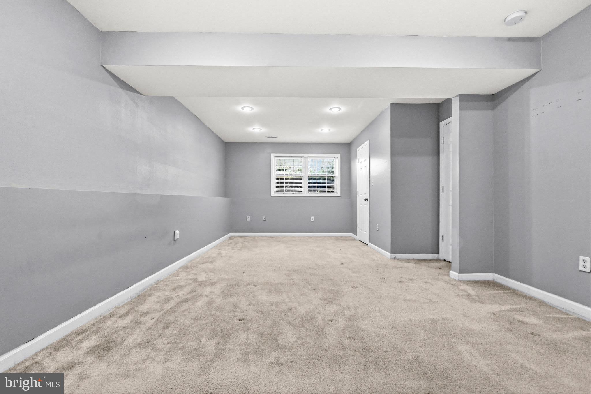 2616 Ruffin Drive Fredericksburg, VA 22408 - Photo 25 of 36 a view of an empty room with windows