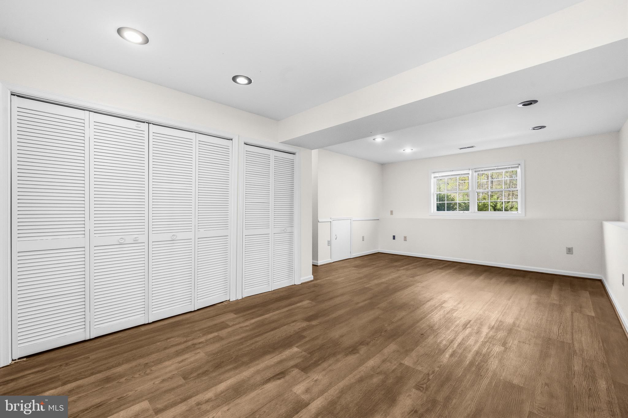 2616 Ruffin Drive Fredericksburg, VA 22408 - Photo 30 of 36 wooden floor in an empty room with a window