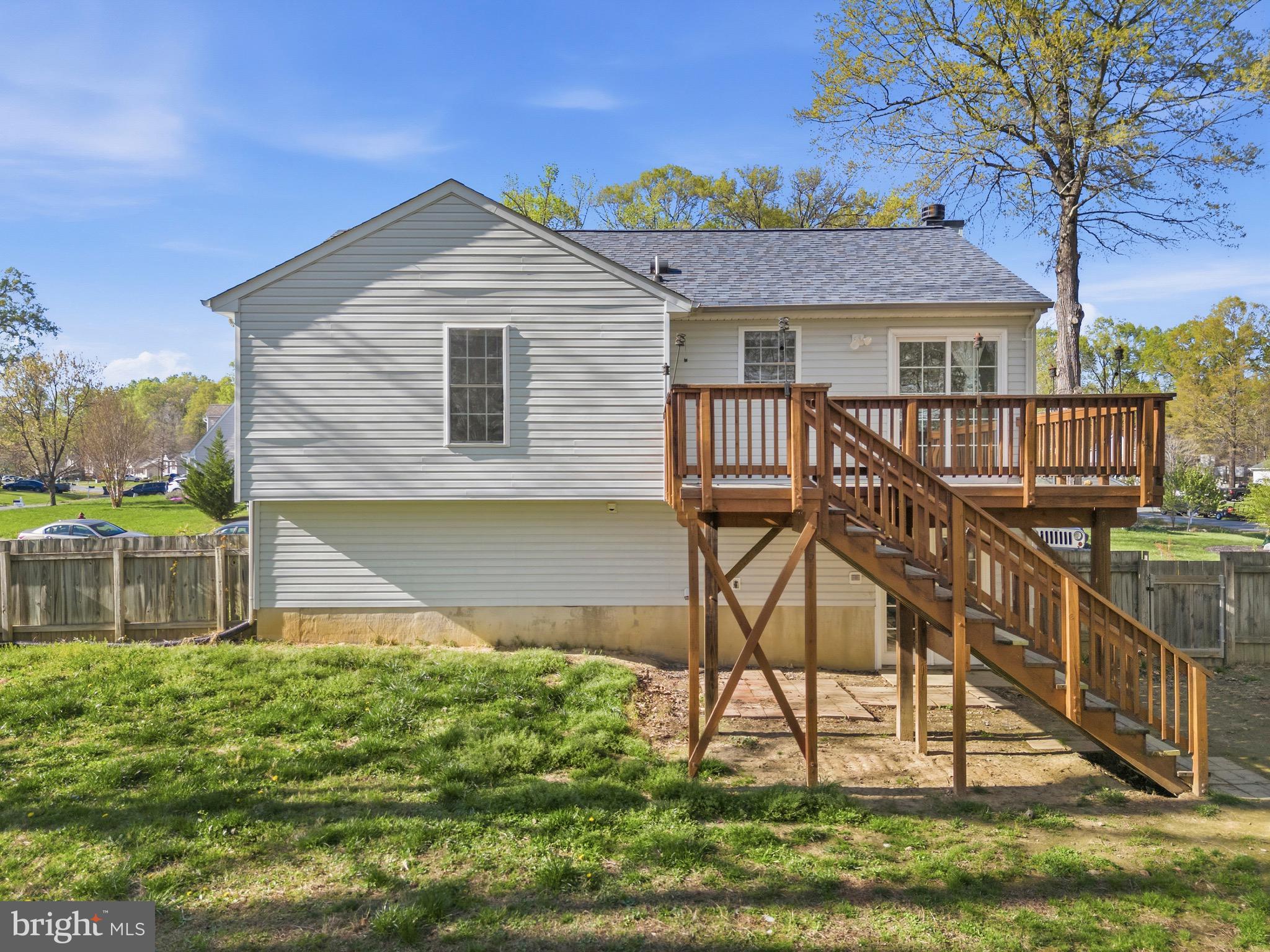 2616 Ruffin Drive Fredericksburg, VA 22408 - Photo 32 of 36 a front view of a house with a yard