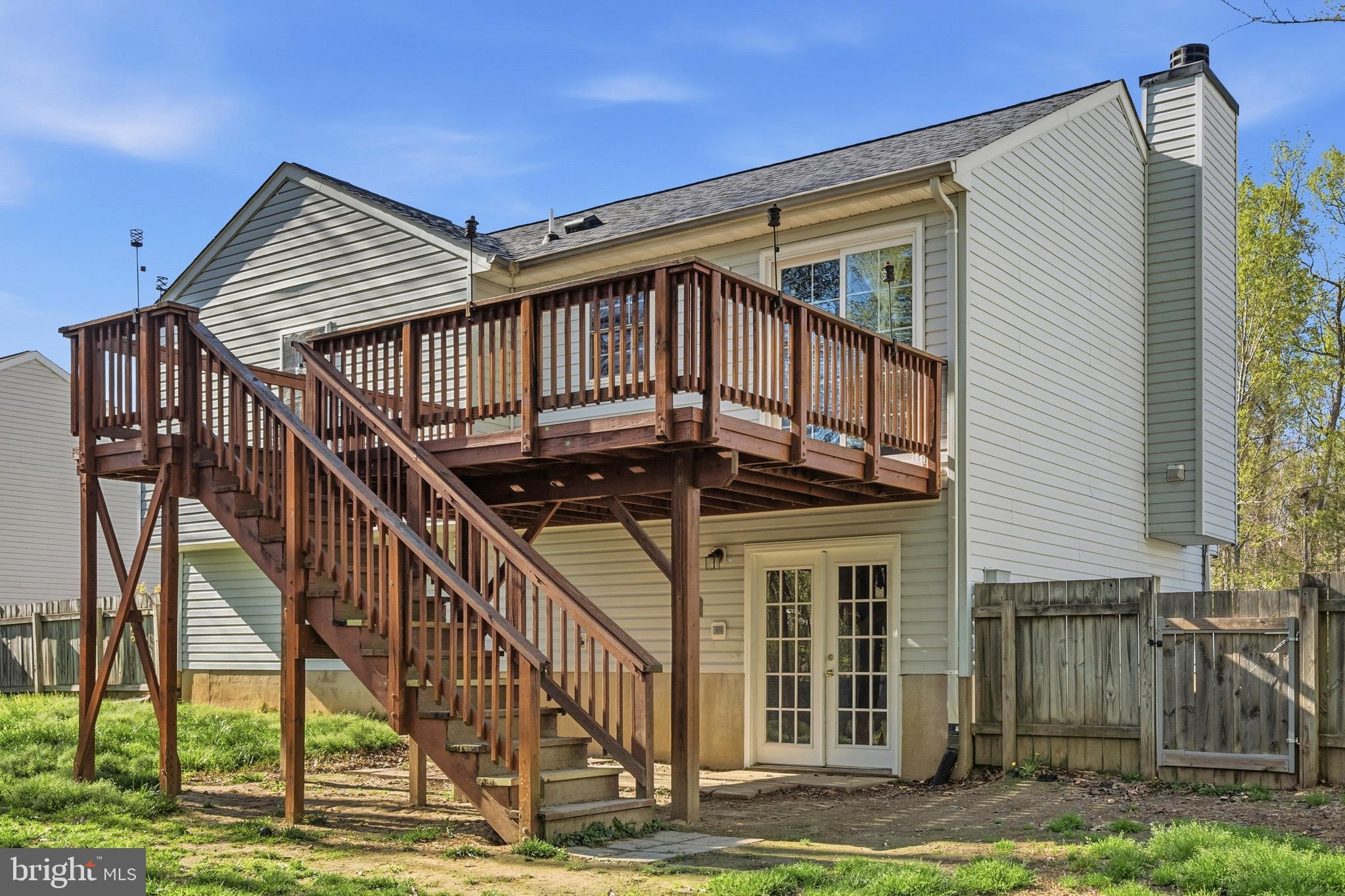 2616 Ruffin Drive Fredericksburg, VA 22408 - Photo 33 of 36 a view of a house with backyard and deck