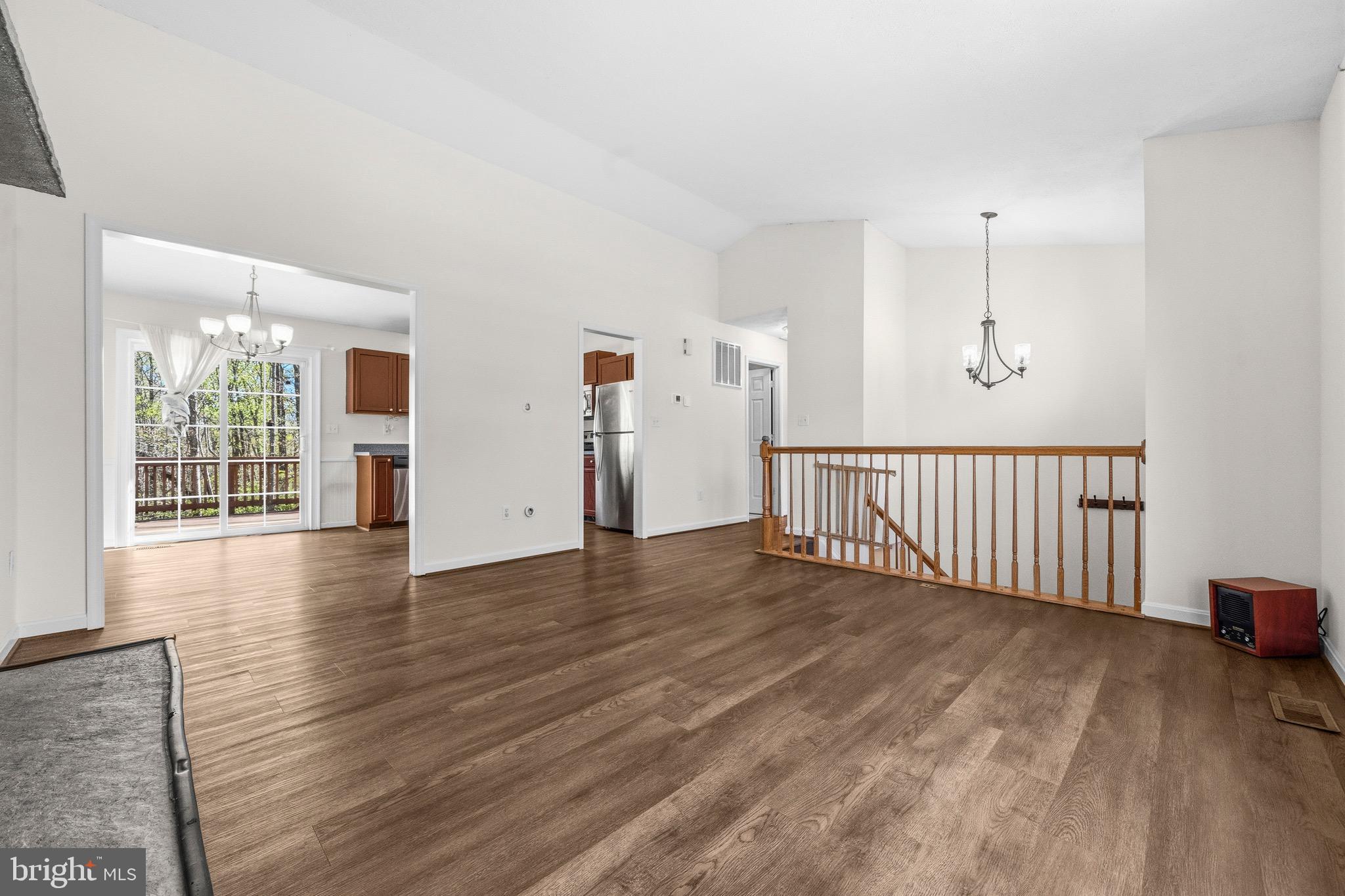 2616 Ruffin Drive Fredericksburg, VA 22408 - Photo 7 of 36 a view of a room with wooden floor and windows