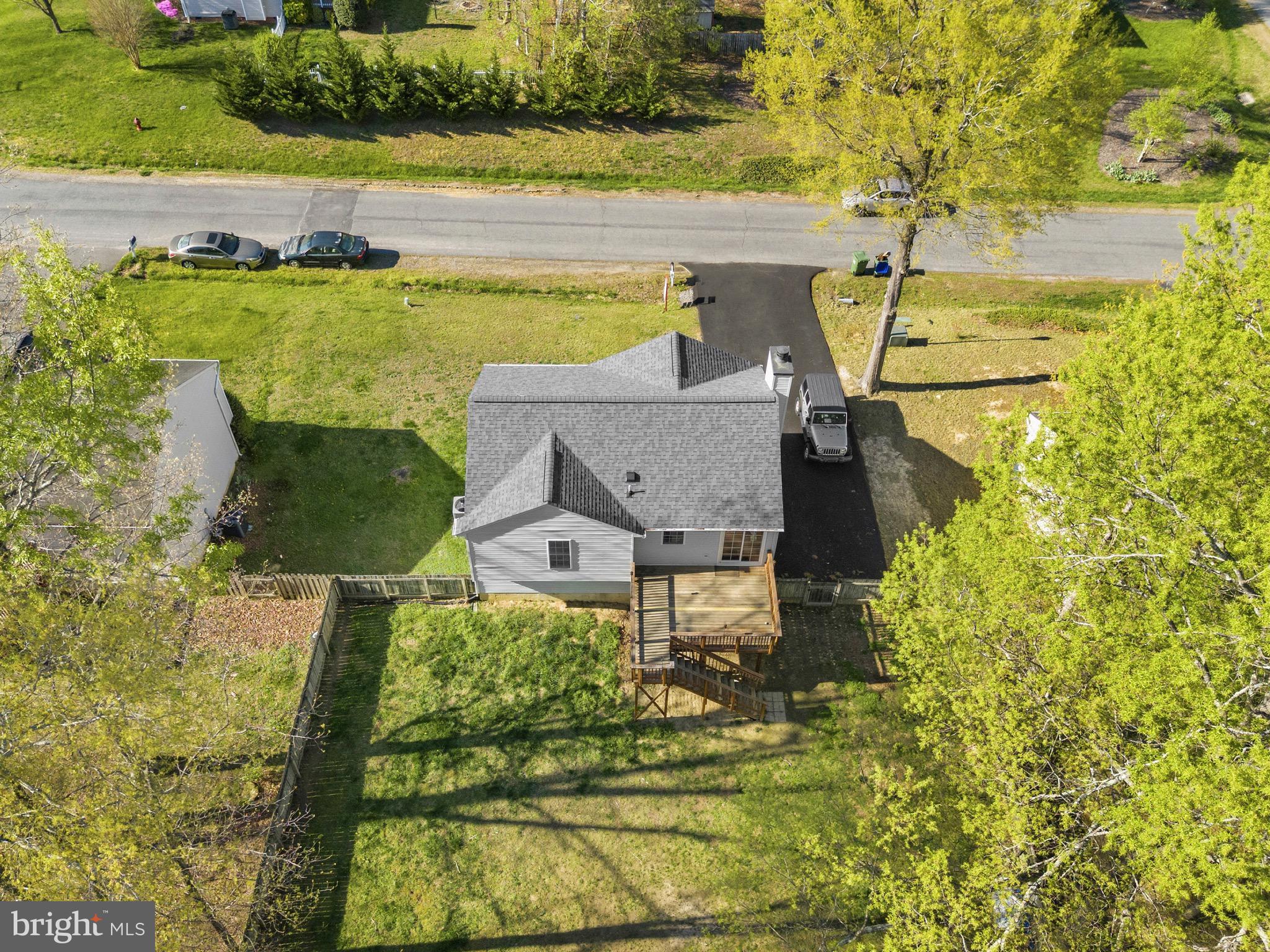 2616 Ruffin Drive Fredericksburg, VA 22408 - Photo 10 of 36 a view of a swimming pool with a yard