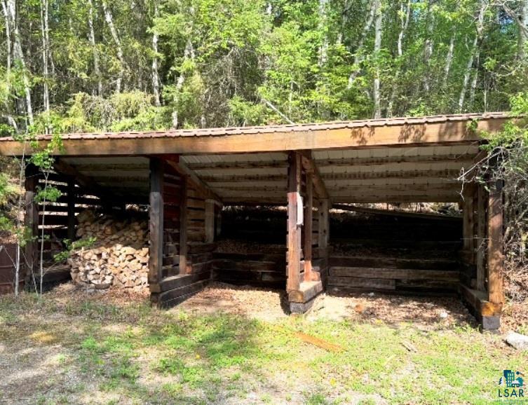 14649 Canadian Border Road Ely, MN 55731 - Photo 15 of 16 Open storage for wood and lake accessories
