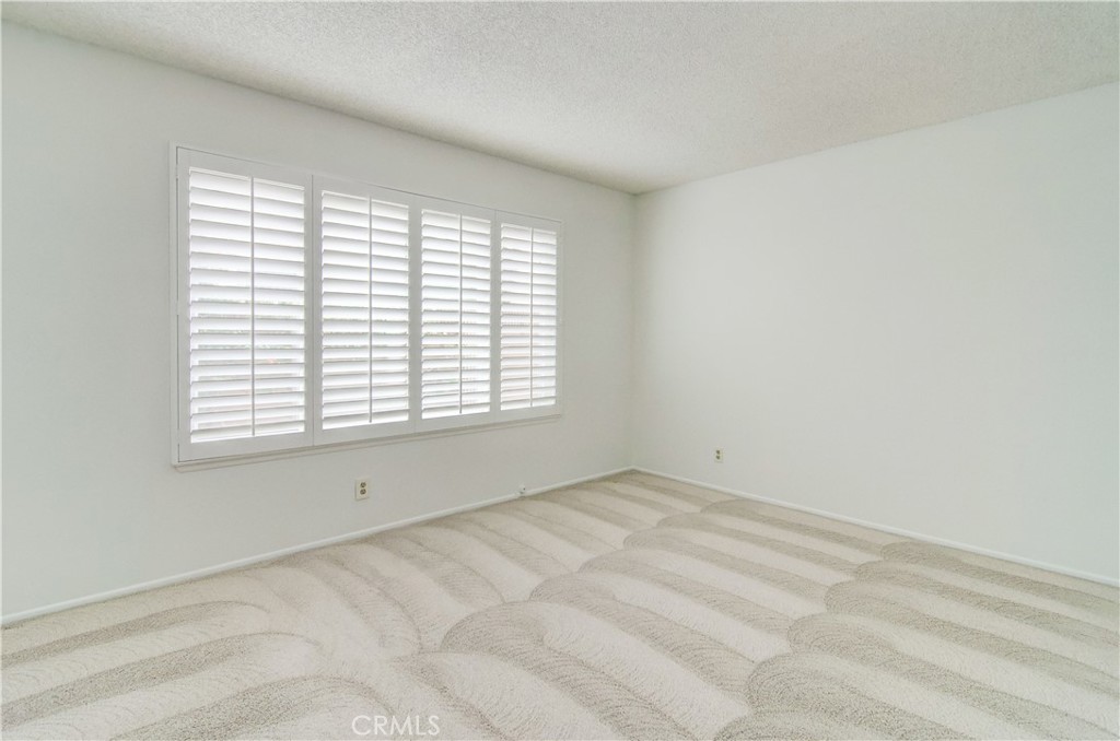10091 Saltair Drive Cypress, CA 90630 - Photo 28 of 42 a view of an empty room with a window
