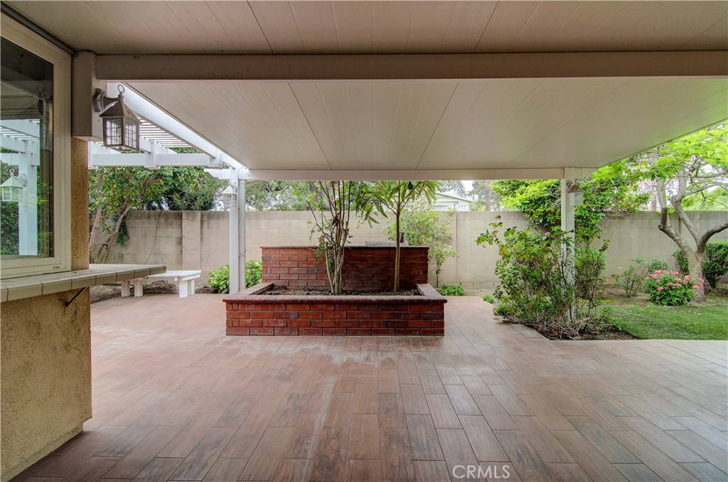 10091 Saltair Drive Cypress, CA 90630 - Photo 34 of 42 a living room with furniture and a garden