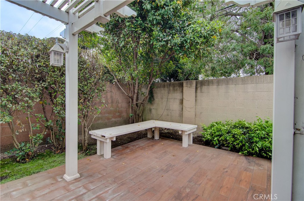 10091 Saltair Drive Cypress, CA 90630 - Photo 37 of 42 a backyard of a house with plants and tree