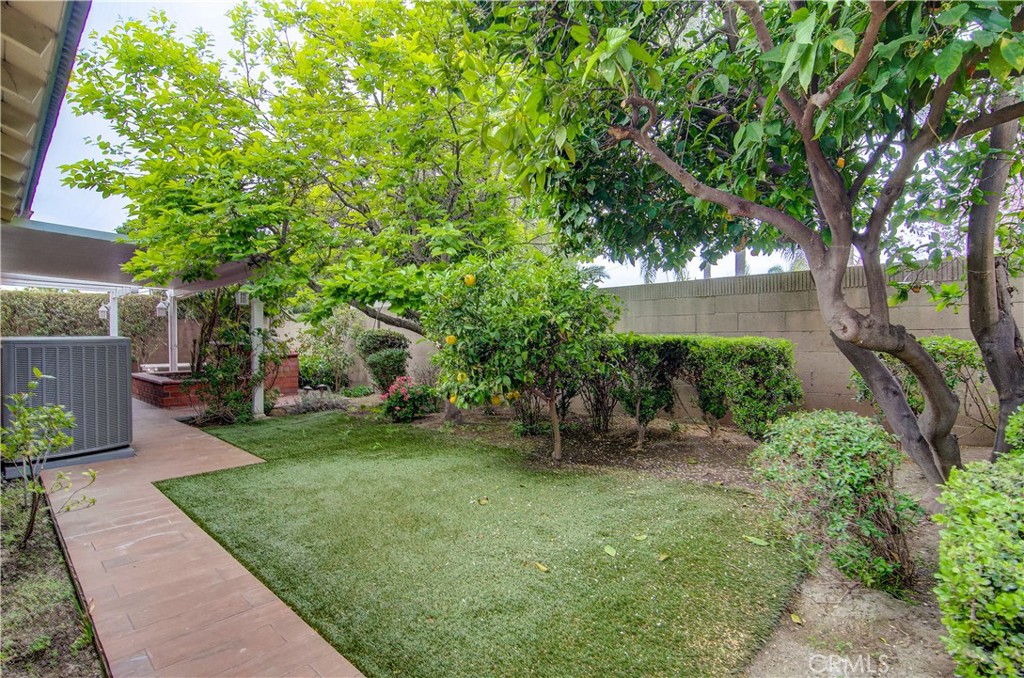 10091 Saltair Drive Cypress, CA 90630 - Photo 40 of 42 a view of a garden with a tree