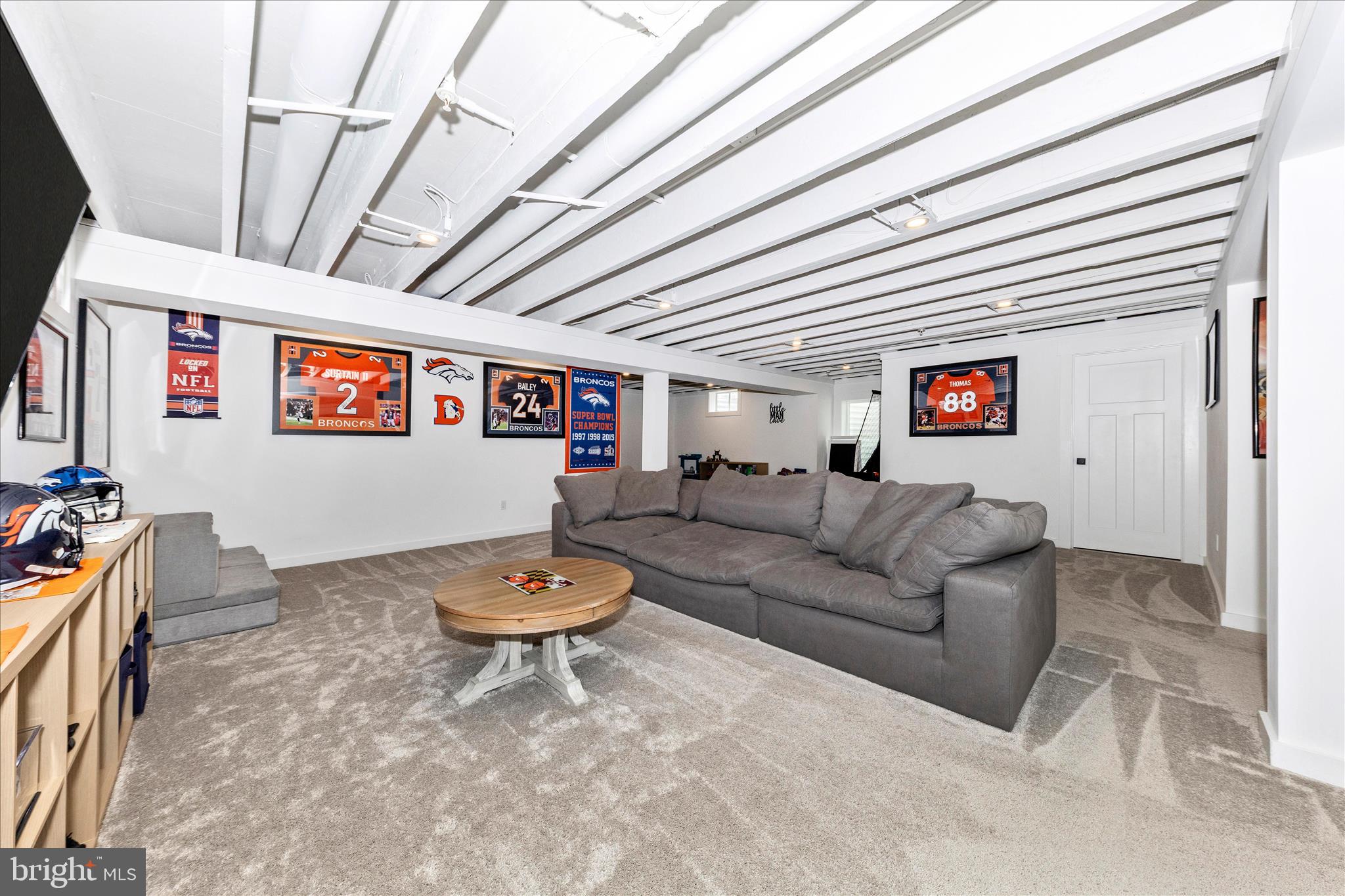 14105 Peddicord Road Mount Airy, MD 21771 - Photo 34 of 52 a living room with furniture and a ceiling fan