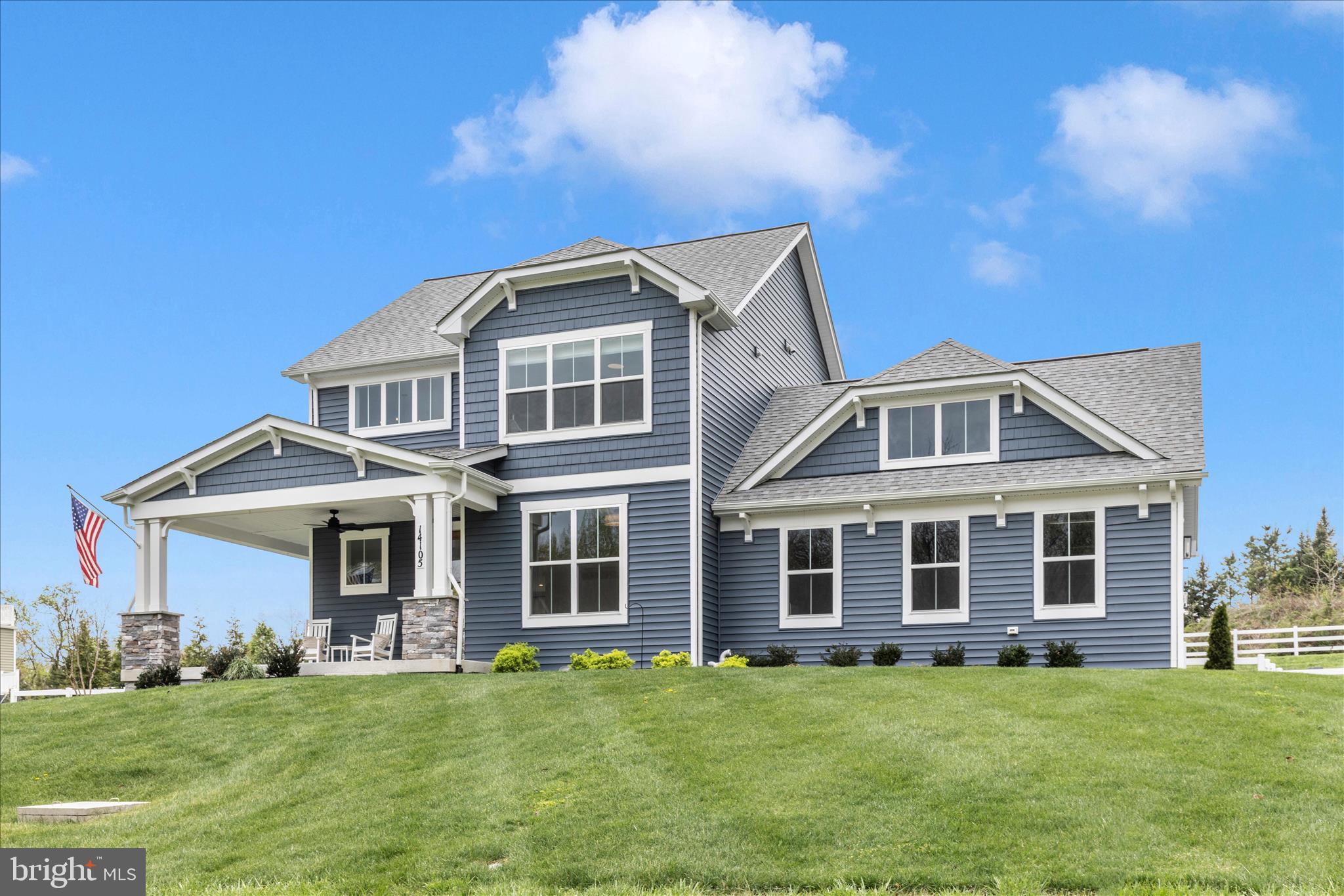 14105 Peddicord Road Mount Airy, MD 21771 - Photo 39 of 52 a front view of a house with a garden