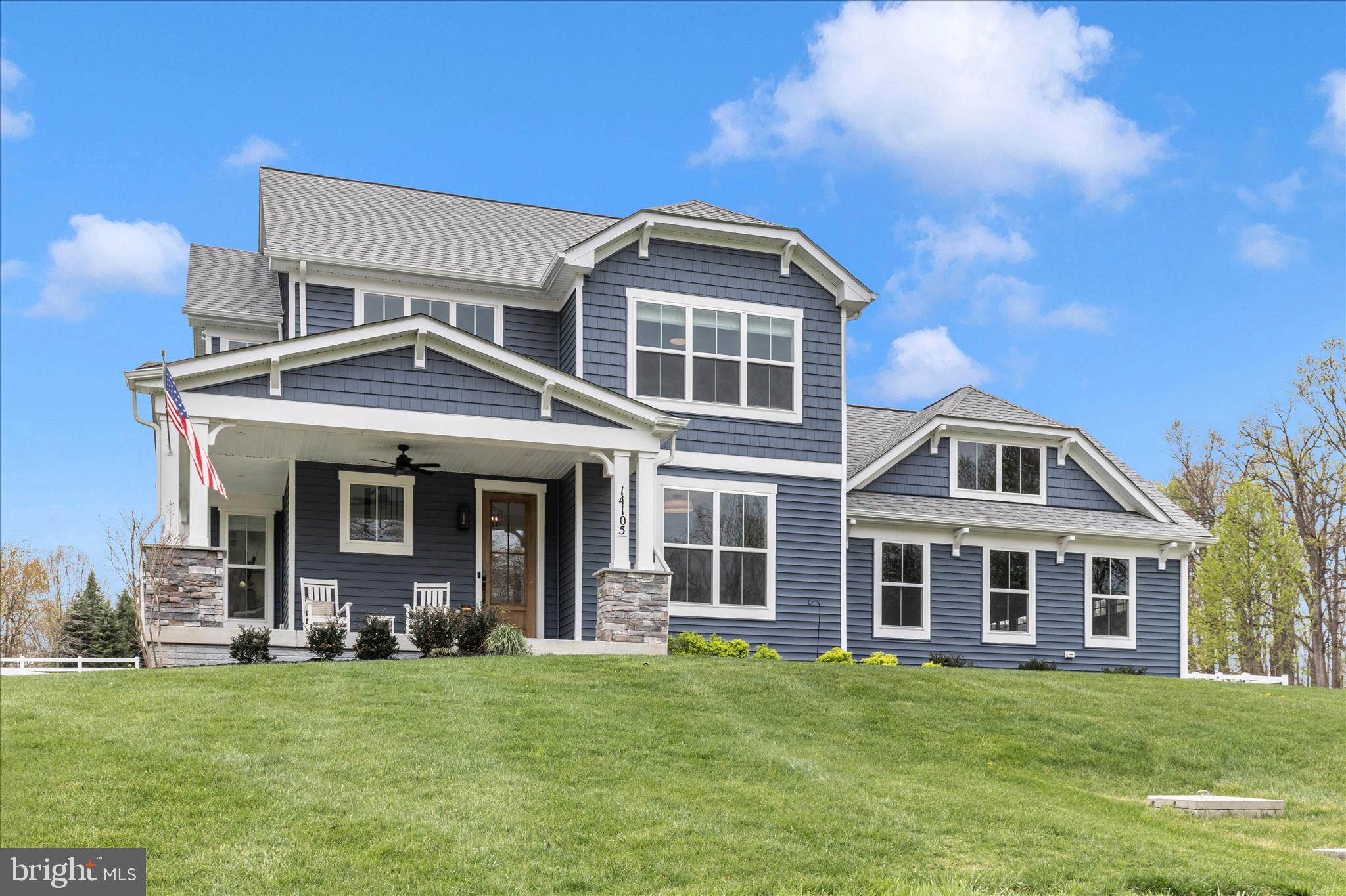 14105 Peddicord Road Mount Airy, MD 21771 - Photo 40 of 52 a front view of a house with a garden