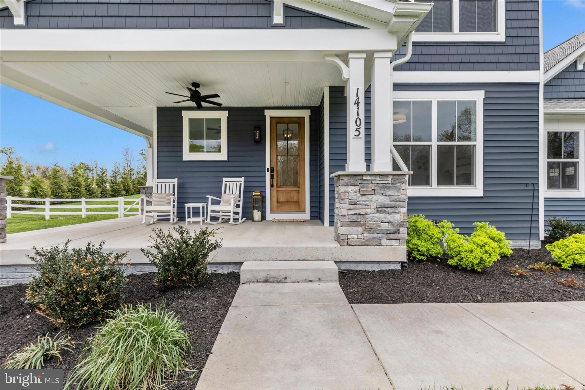 14105 Peddicord Road Mount Airy, MD 21771 - Photo 43 of 52 a front view of a house with a garden